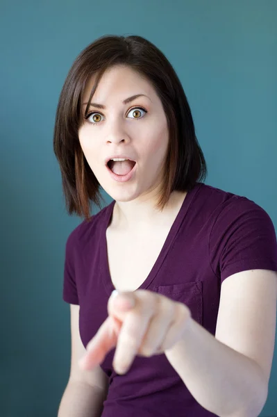 Shocked woman pointing — Stock Photo, Image
