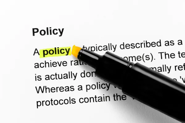 Policy text highlighted in yellow — Stock Photo, Image