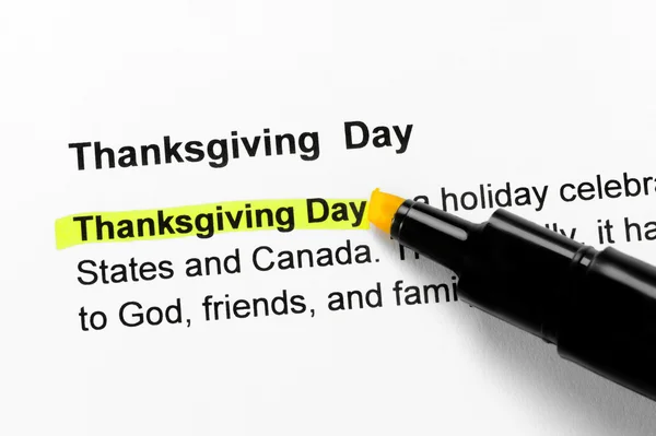 Stock image Thanksgiving Day text highlighted in yellow