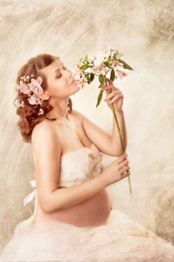 çiçek koklama ve rüya hamile kadın.