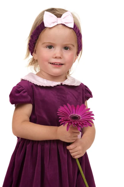 Malá dívka s květinou — Stock fotografie