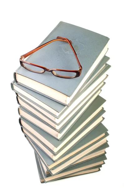 Stack of books and eyeglasses — Stock Photo, Image