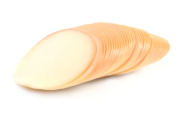 Κομμένο σε φέτες τυρί σκληρό πάνω από λευκό — Φωτογραφία Αρχείου