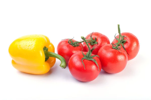 Close up of ripe tomatoes and yellow pepper — Stock Photo, Image
