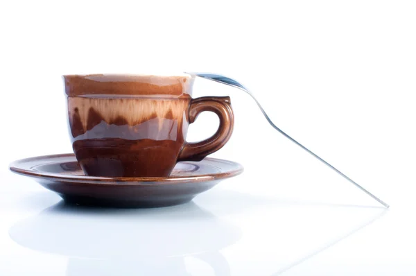 Šálek kávy a lžička — Stock fotografie