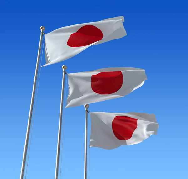 Vlajka Japonsko proti modré obloze. — Stock fotografie