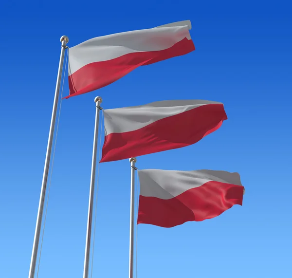 Flaggor av Polen mot blå himmel. — Stockfoto