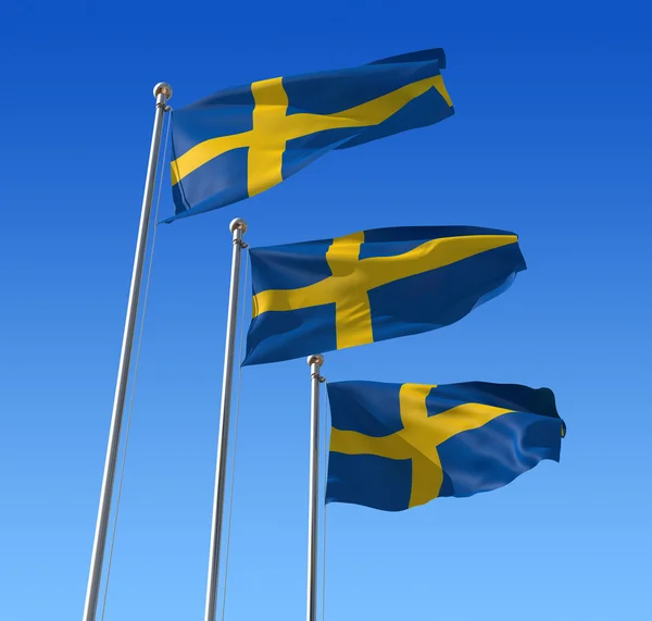 Bandeiras da Suécia contra o céu azul . — Fotografia de Stock
