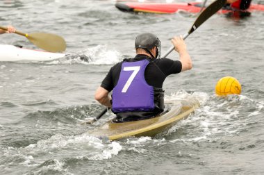 Man is playing kayak polo clipart