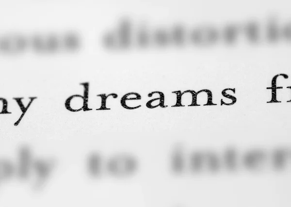 Woord dromen in tekst — Stockfoto