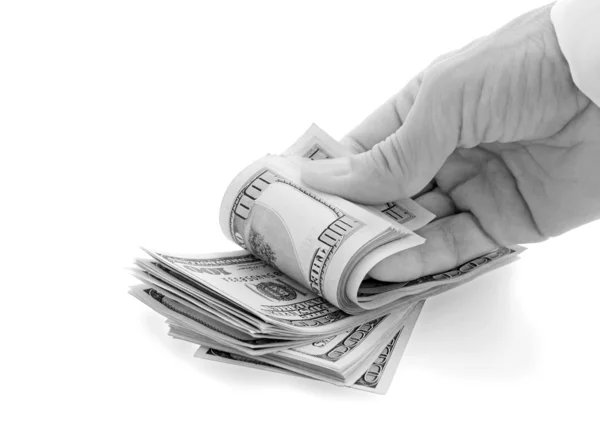 Hand fingers pile of dollars — Stock Photo, Image