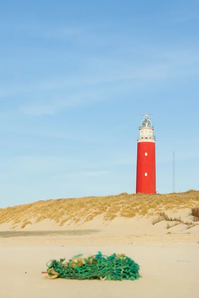 Lighthouse at the beach — Stock Photo, Image