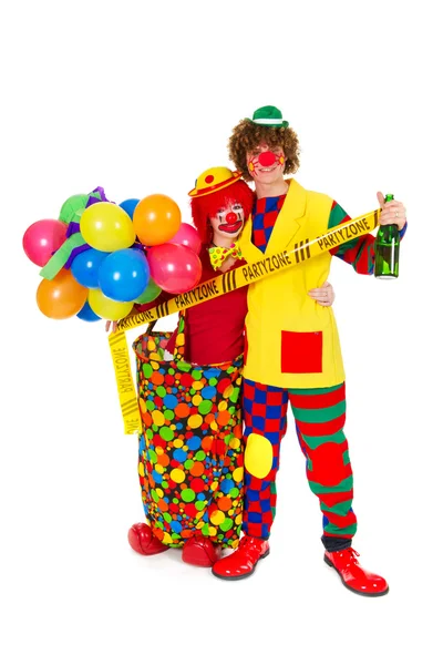 Coppia buffi clown con palloncini in zona festa — Foto Stock