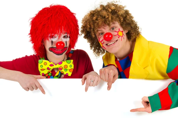 Lustige Clowns mit weißem Brett — Stockfoto