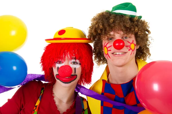 Couple funny clowns with balloons — Stock Photo, Image