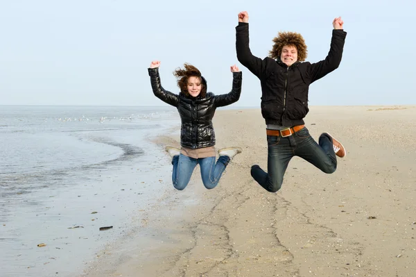 stock image Jumping at the beach