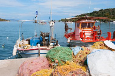 Fishing boats in Greek harbor clipart