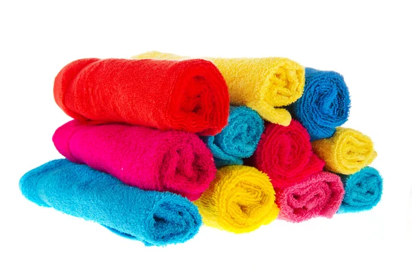 Kleurrijke warmgewalste handdoeken — Stockfoto