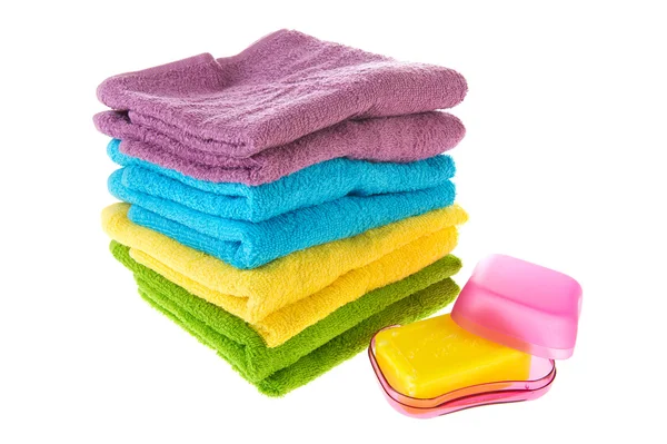 Stacked towels and soap — Stock Photo, Image