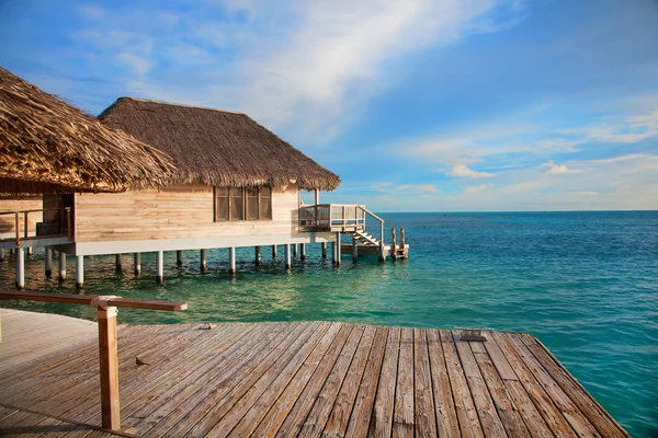 Tropical hut on poles — Stock Photo, Image
