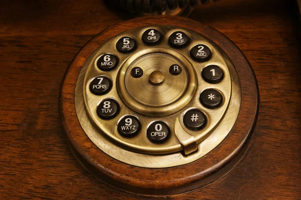 The old desk's phone dial disc — Stock Photo, Image
