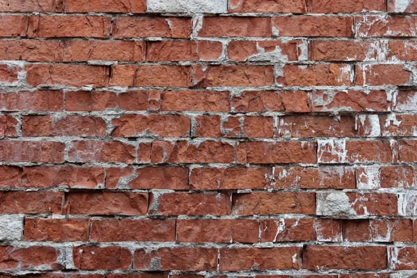 Fragmento de pared de ladrillo envejecido — Foto de Stock