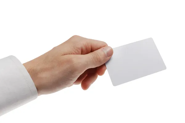 Tarjeta de plástico blanco en la mano del hombre Imagen De Stock
