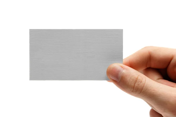 Visite o cartão na mão. Isolado em branco — Fotografia de Stock