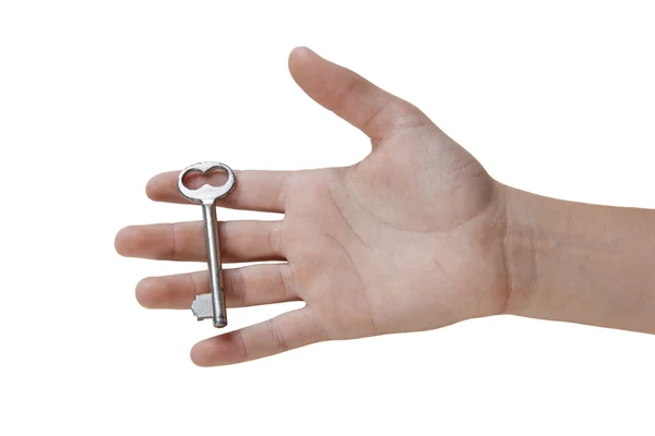 Мальчик держит ключ в руке . — стоковое фото