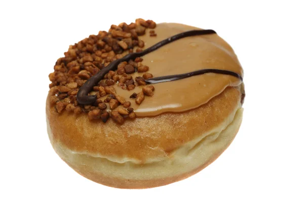 Un donut con nueces, caramelo y chocolate — Foto de Stock