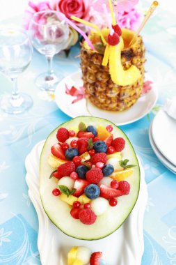 Fresh fruit salad with pineapple drink clipart