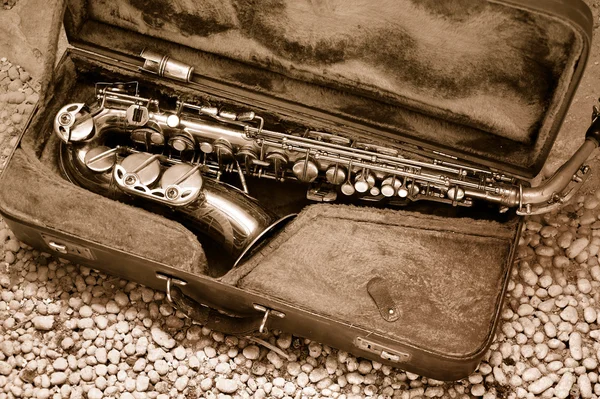 stock image Saxophone in old leather case