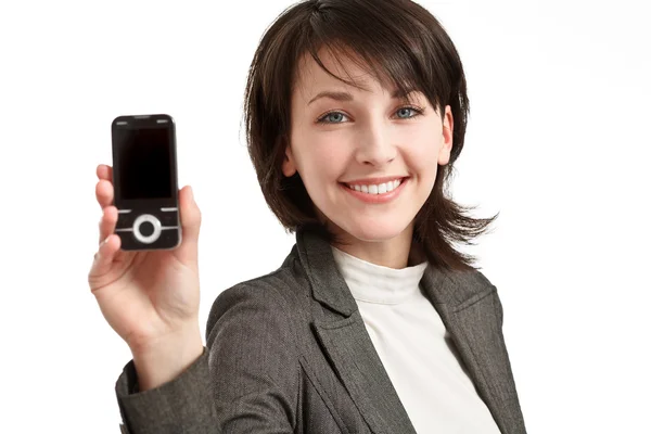 Gülümseyen genç kadın cep telefonu ile el — Stok fotoğraf