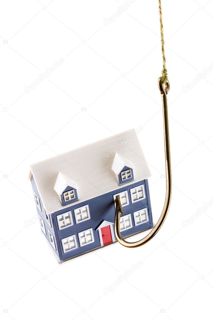 House on a fishing hook isolated on white