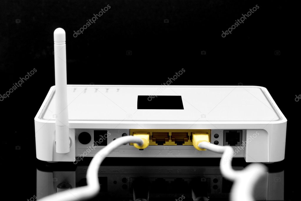 Wireless router with cables flying out, on a black background