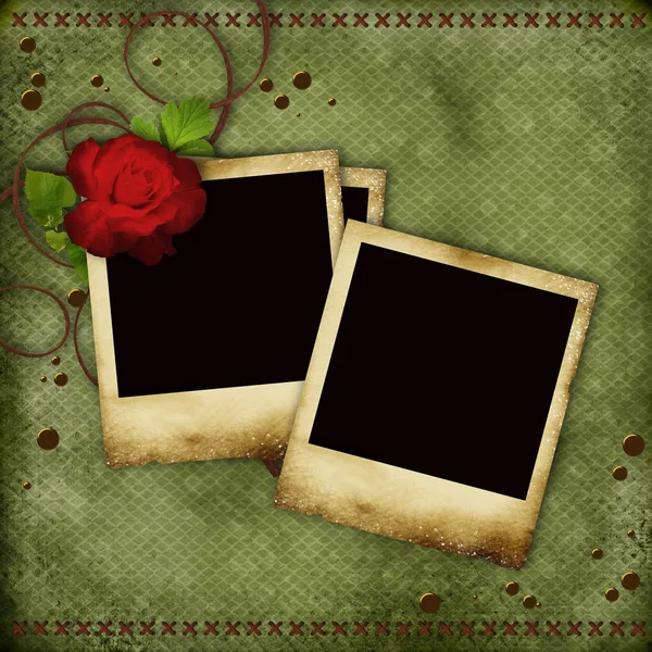 Ročník karta s červené růže a staré rámečky na fotografie — Stock fotografie