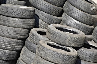 Pile of used tyres clipart