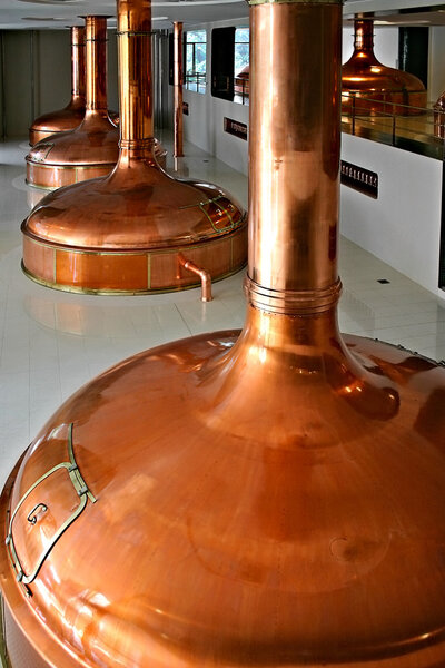 Bohemian brewery with copper distillery tanks
