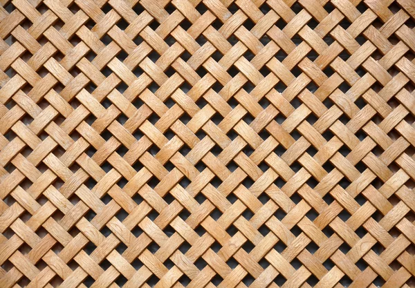 Griglia di legno, lo sfondo di legno intrecciato — Foto Stock