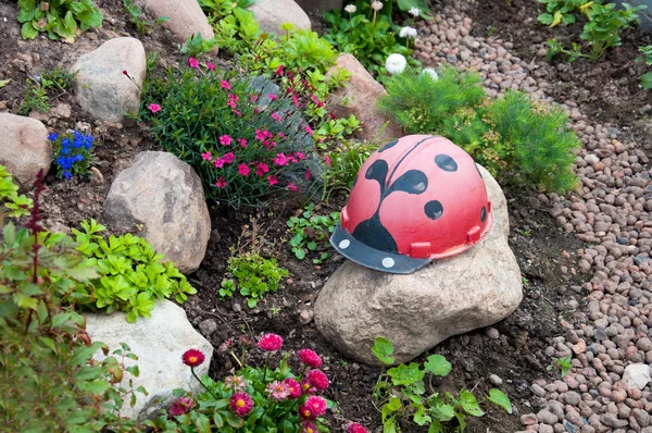 stock image Landscaping, construction of a ladybird helmet