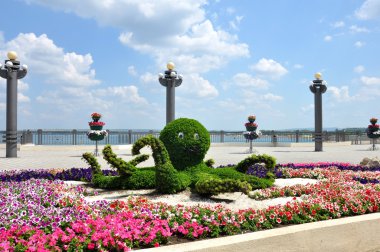 Octopus, floral arrangement on the seafront of Anapa clipart