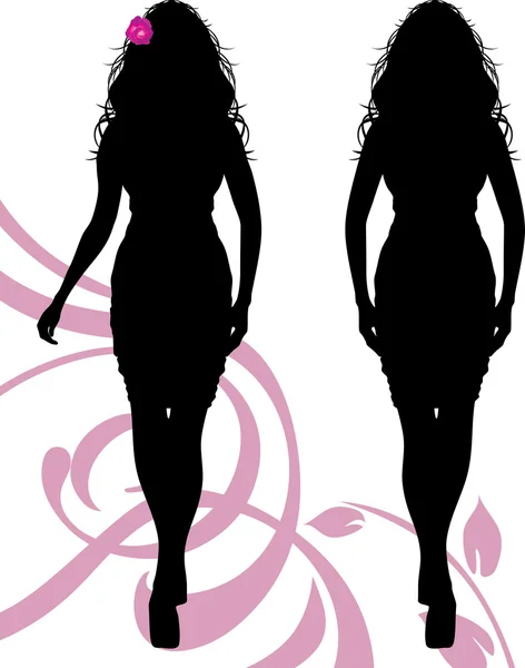 Female silhouettes with floral ornament — Stock Vector