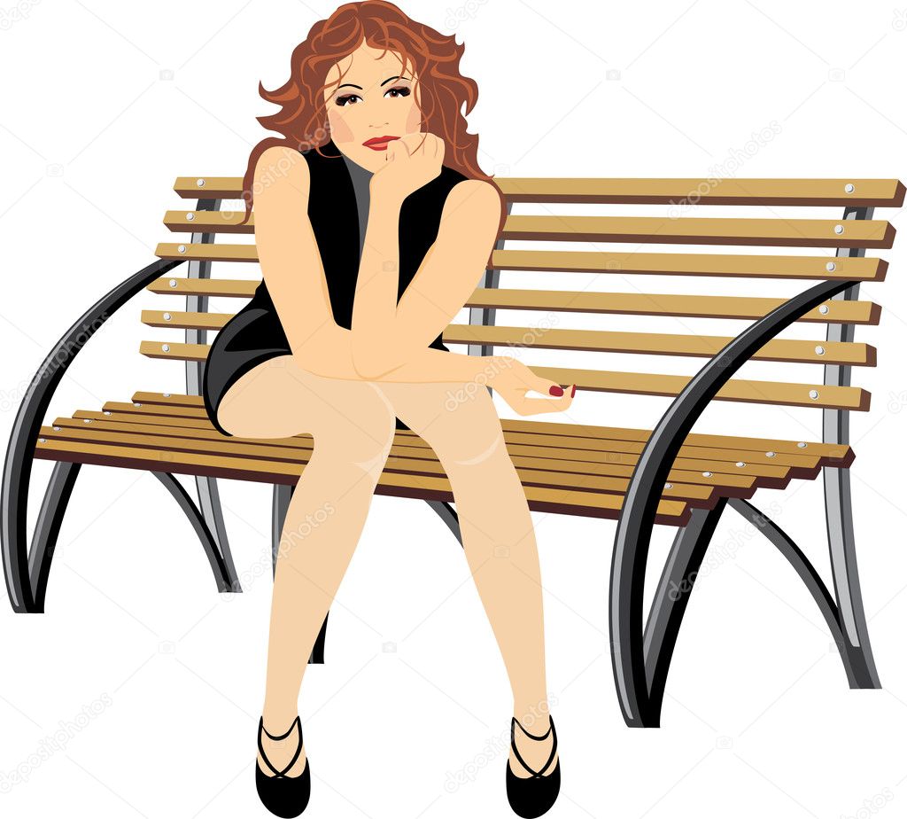 Beautiful woman sitting on the wooden bench