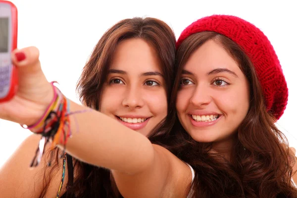 Las mujeres jóvenes toman una foto — Foto de Stock