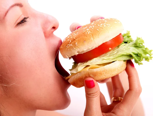 Hamburger yiyen kadın — Stok fotoğraf