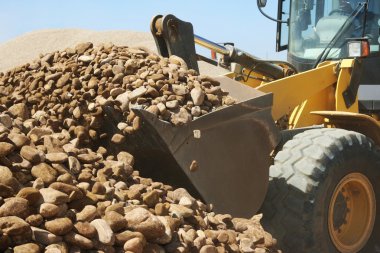 Loader and Stones on Quarry clipart