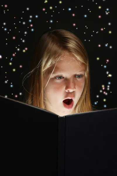 stock image Young Girl Reading a Fantasy Book