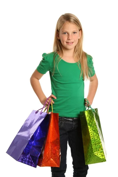 Jonge blonde winkelen meisje — Stockfoto