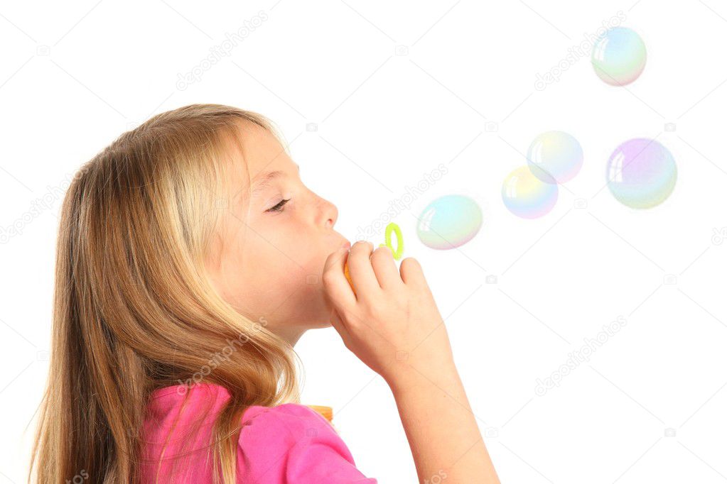 Pretty Kid Blowing Bubbles