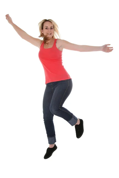 Menina loira bonita pulando para a alegria — Fotografia de Stock